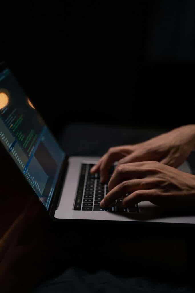 person-using-silver-and-black-laptop-computer